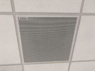 Ceiling microphone installed in a drop ceiling