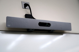 student auto-tracking camera located above a markerboard at the front